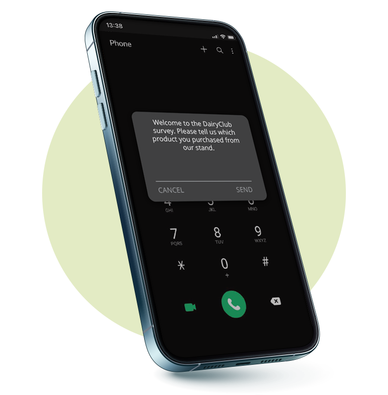 A 3D smartphone displaying an example of a USSD application menu screen that says, “Welcome to the DairyClub survey. Please tell us which product you purchased from our stand.” with a field option for the user to type in their response and either tap SEND or CANCEL.